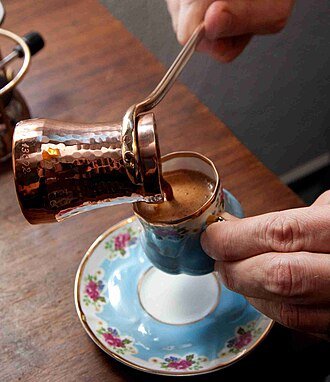 Turkish coffee poured